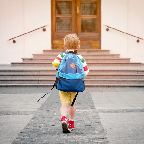 Child walking into school